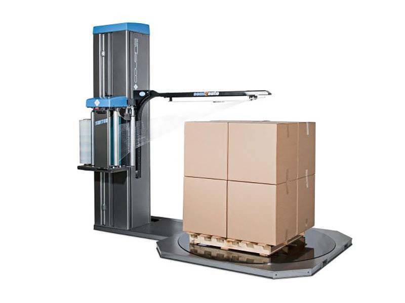 large gray stretch wrap machine with a pallet and cardboard box
