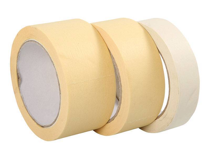 three rolls of off-white masking tape of varying sizes
